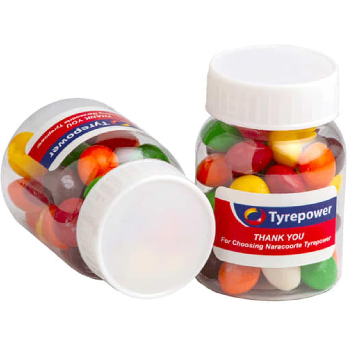 A clear jar filled with colourful Skittles candies, featuring a logo on the lid.