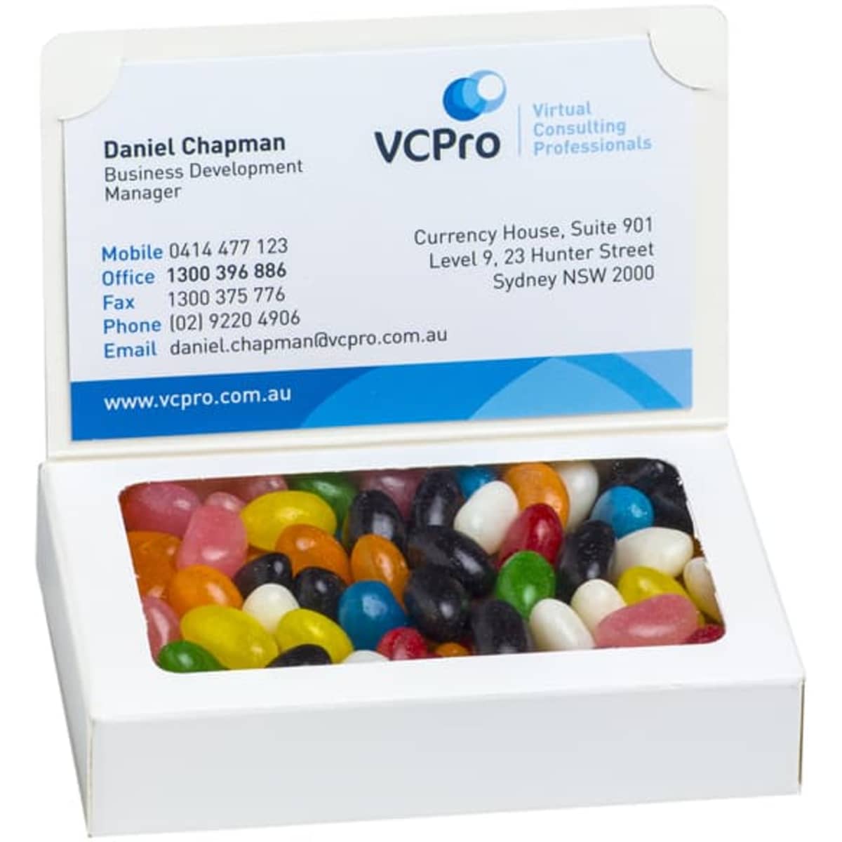 A Bizcard Box featuring a variety of colourful mini jelly beans, with a business card included in a white box.
