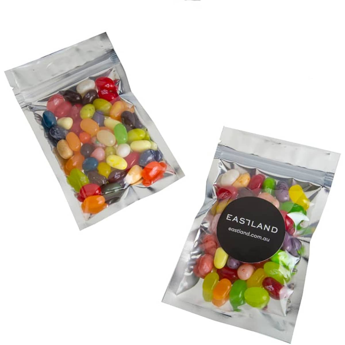 A silver zip lock bag containing various colourful JELLY BELLY jelly beans, featuring a logo on the front.