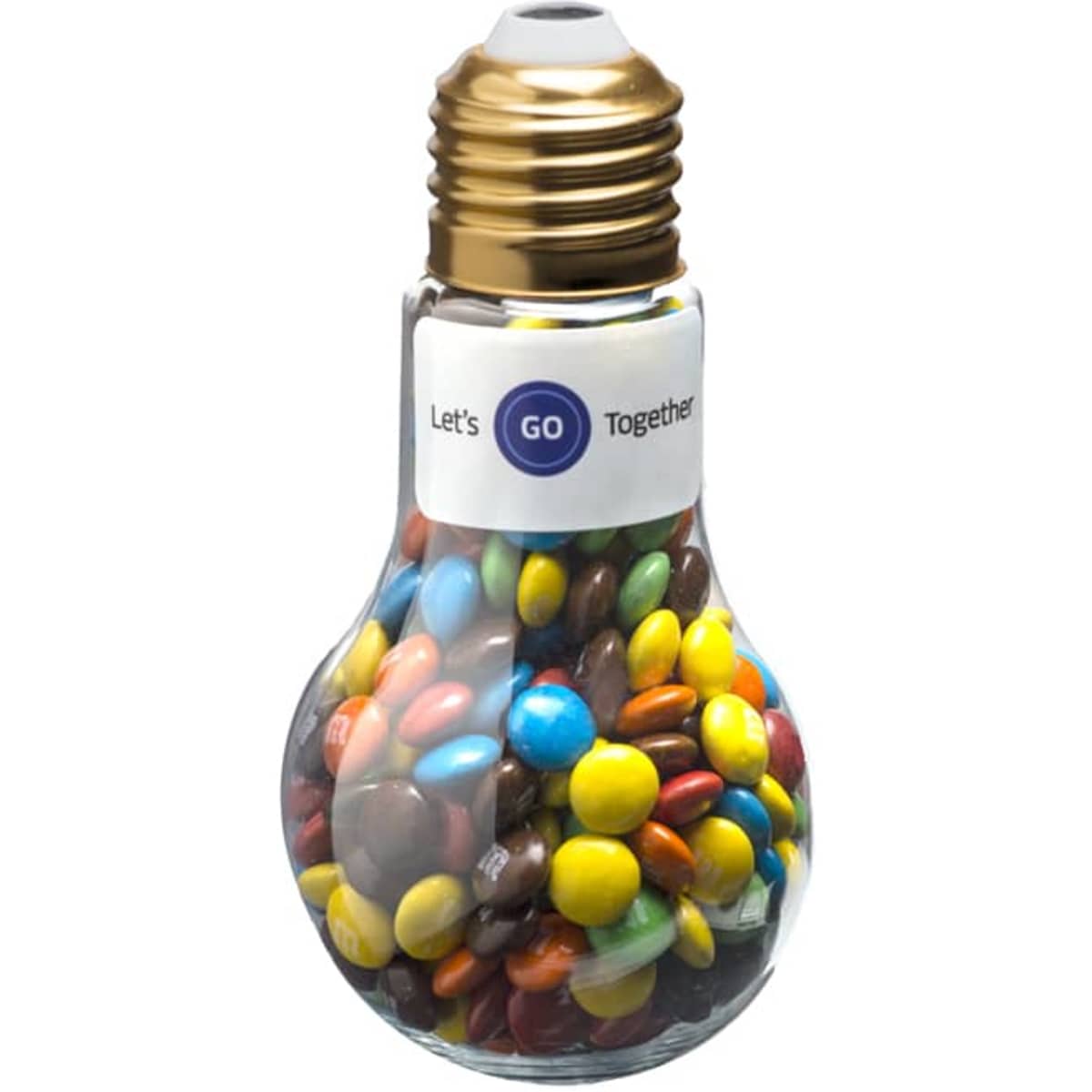 A light bulb-shaped container filled with colourful M&Ms, featuring a golden cap and a label.