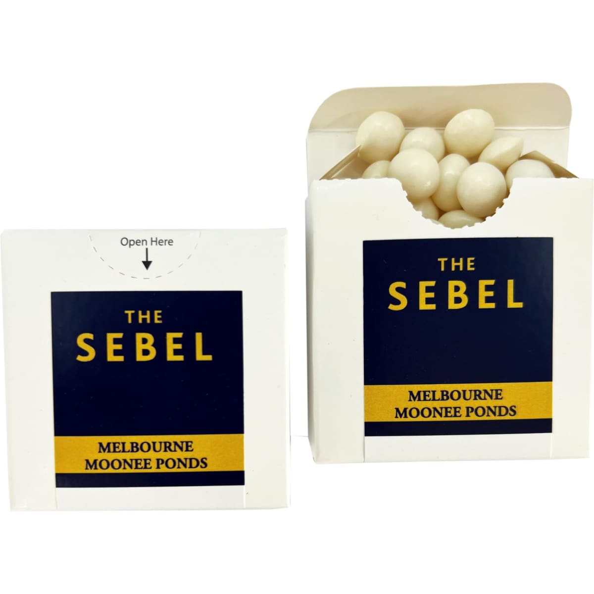 A cardboard box with a flip lid containing white mints, featuring blue and yellow branding.