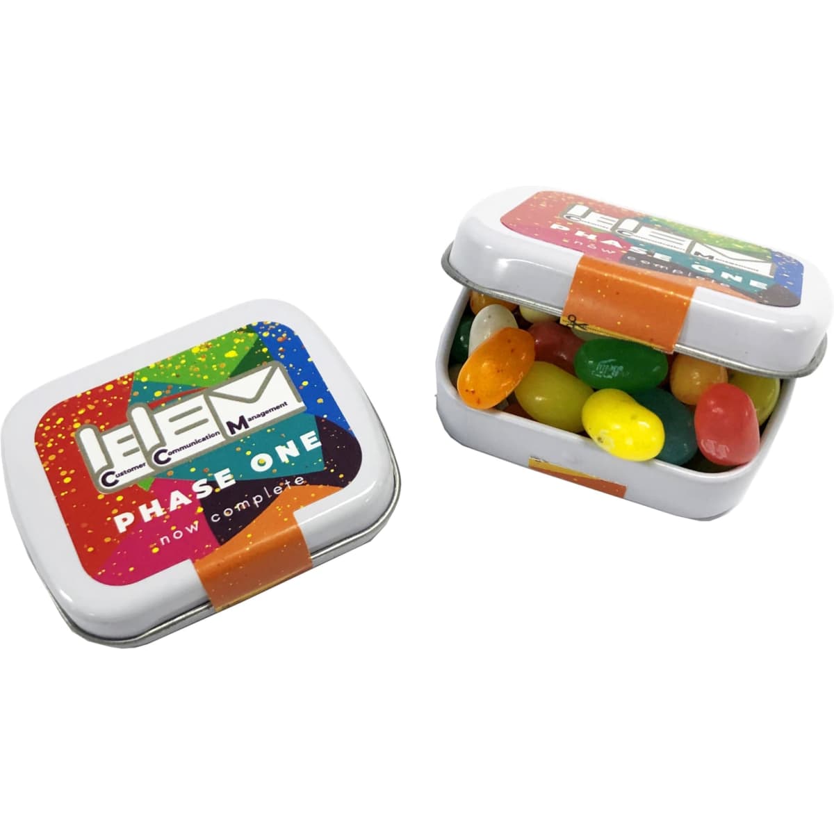 A small rectangular tin filled with colourful JELLY BELLY jelly beans. The tin features a logo design.