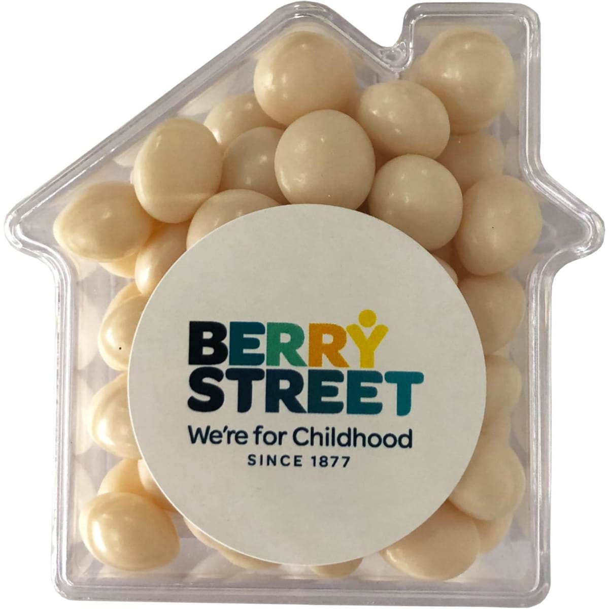 A clear acrylic house-shaped container filled with white mints, featuring a circular logo on the front.