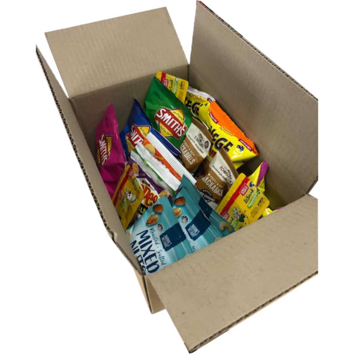 A cardboard box filled with assorted snack packets, including savoury chips and mixed nuts, in vibrant colours.