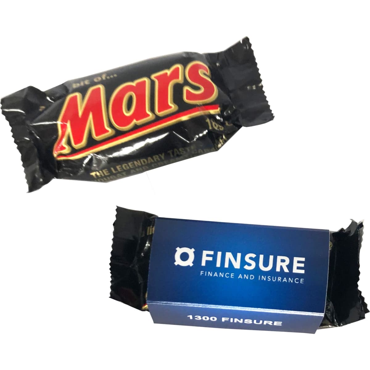 A Mars Bar wrapped in black packaging with bold red lettering, alongside a blue box featuring a logo.