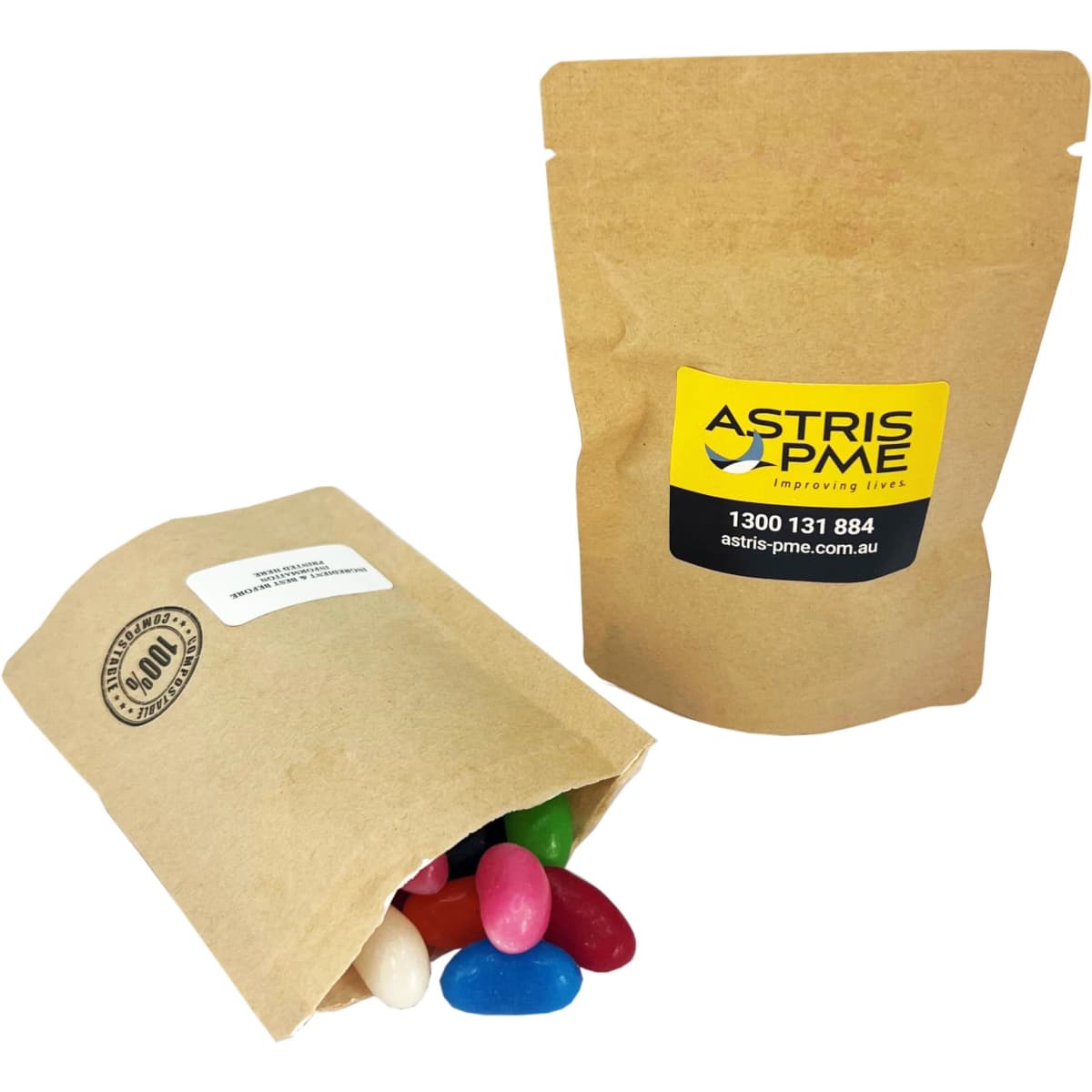 A kraft paper bag containing colourful jelly beans, with another closed bag beside it, featuring a logo.