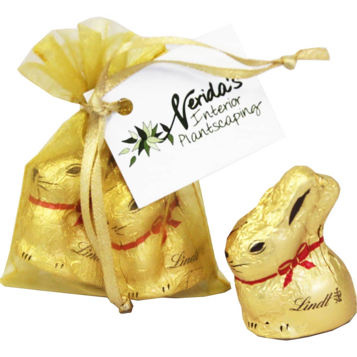 A gold organza bag containing two 10g Lindt chocolate bunnies, tied with ribbon and a branded tag.