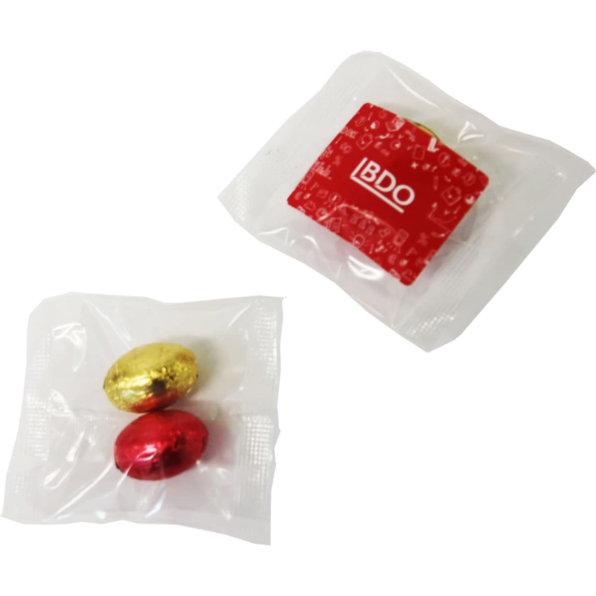 Mini solid Easter eggs in gold and red foil, packaged together in clear plastic. Includes a branded item in red.
