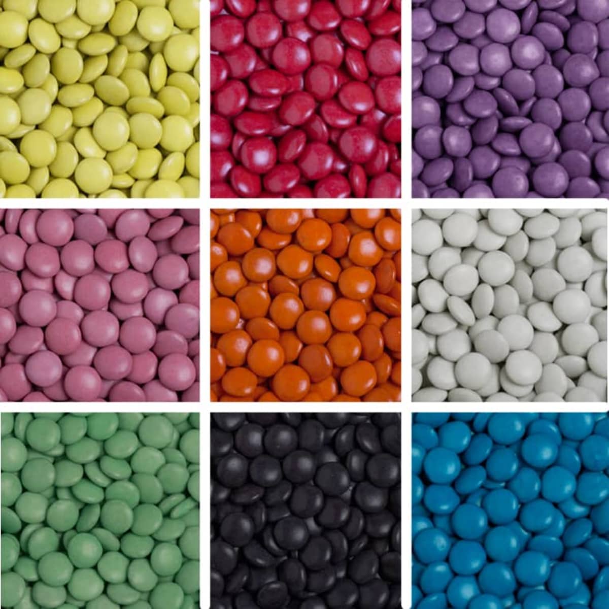 A grid of colourful chocolate beans in yellow, red, purple, pink, orange, white, green, black, and dark grey.