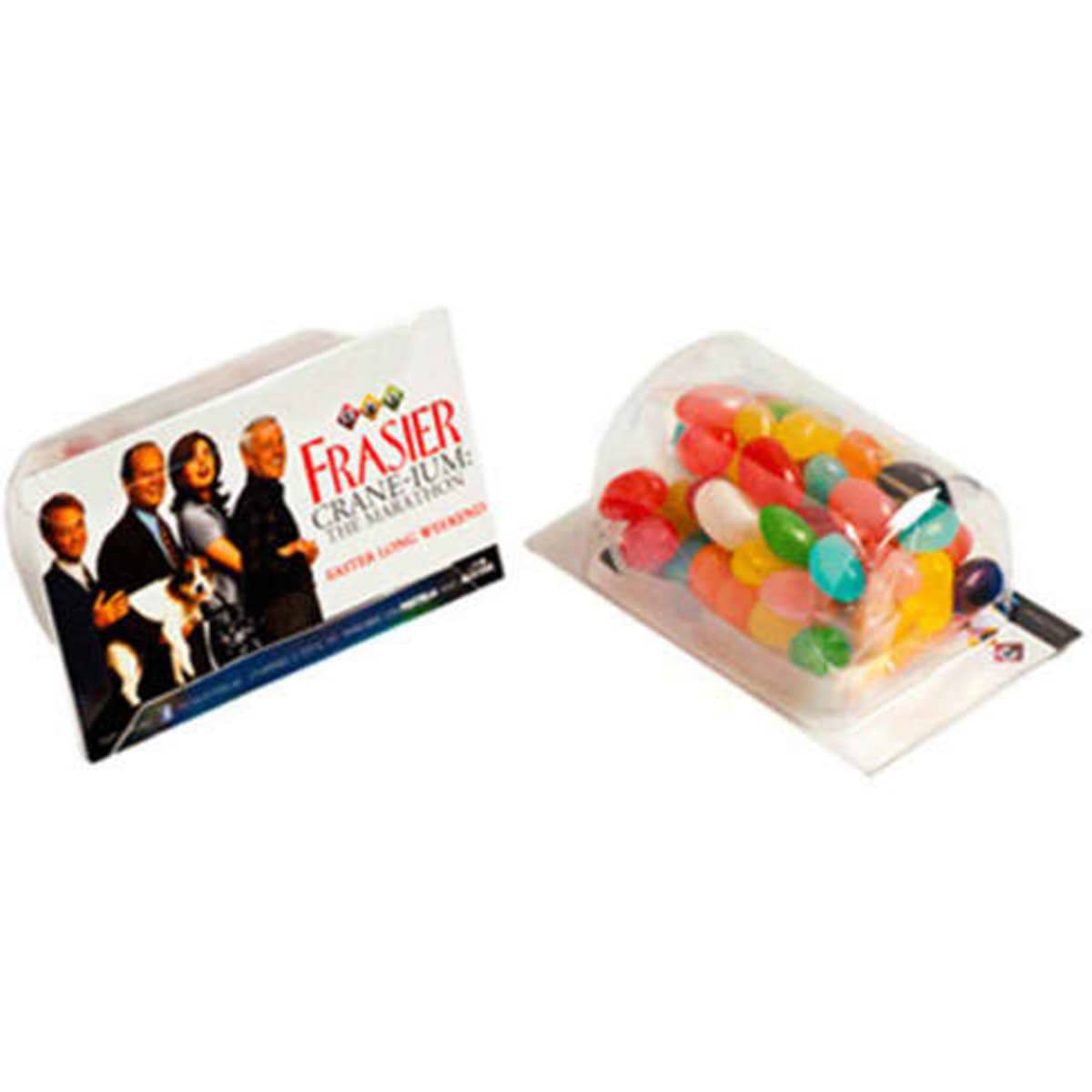 A clear container filled with colourful mini jelly beans, alongside a promotional card featuring a group image.