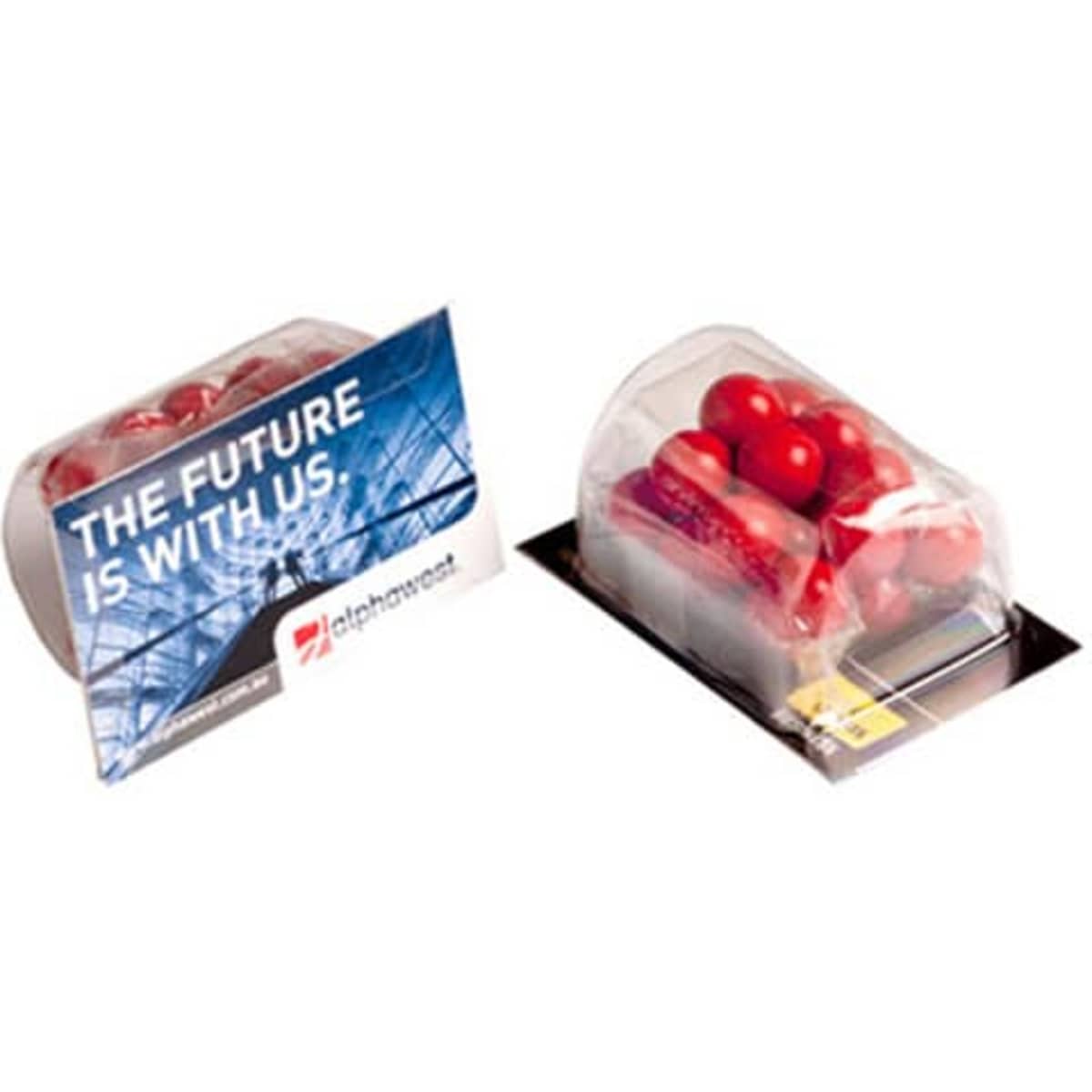 A transparent container filled with orange chocolate drops, accompanied by a branded packaging.