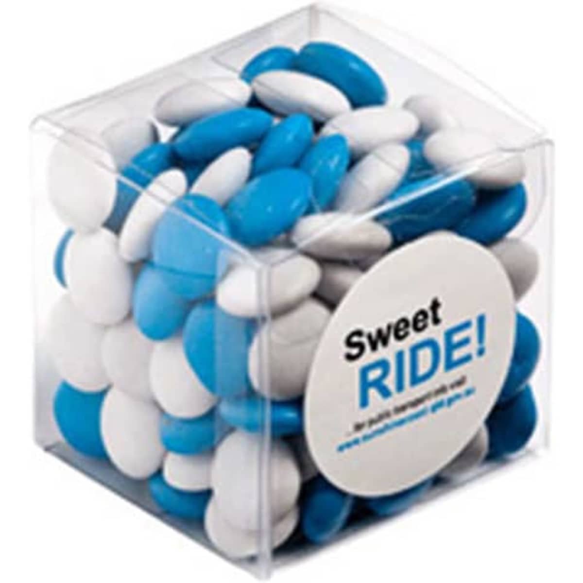 A clear cube filled with blue and white chocolate beans, with a circular branding logo on the front.