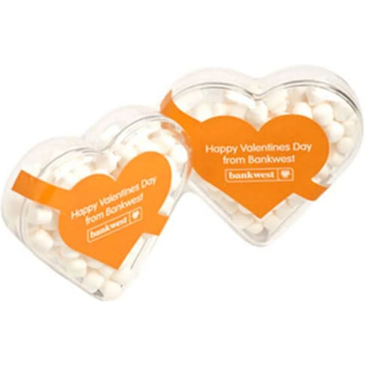 Acrylic heart-shaped container filled with white mints, featuring an orange band and a logo.