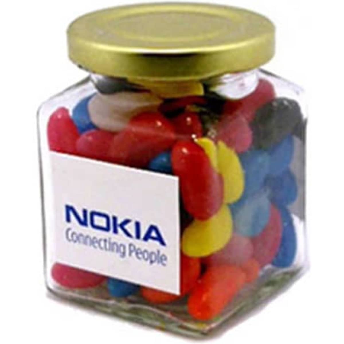 A glass square jar filled with colourful mini jelly beans, featuring a gold lid and a logo on the jar.