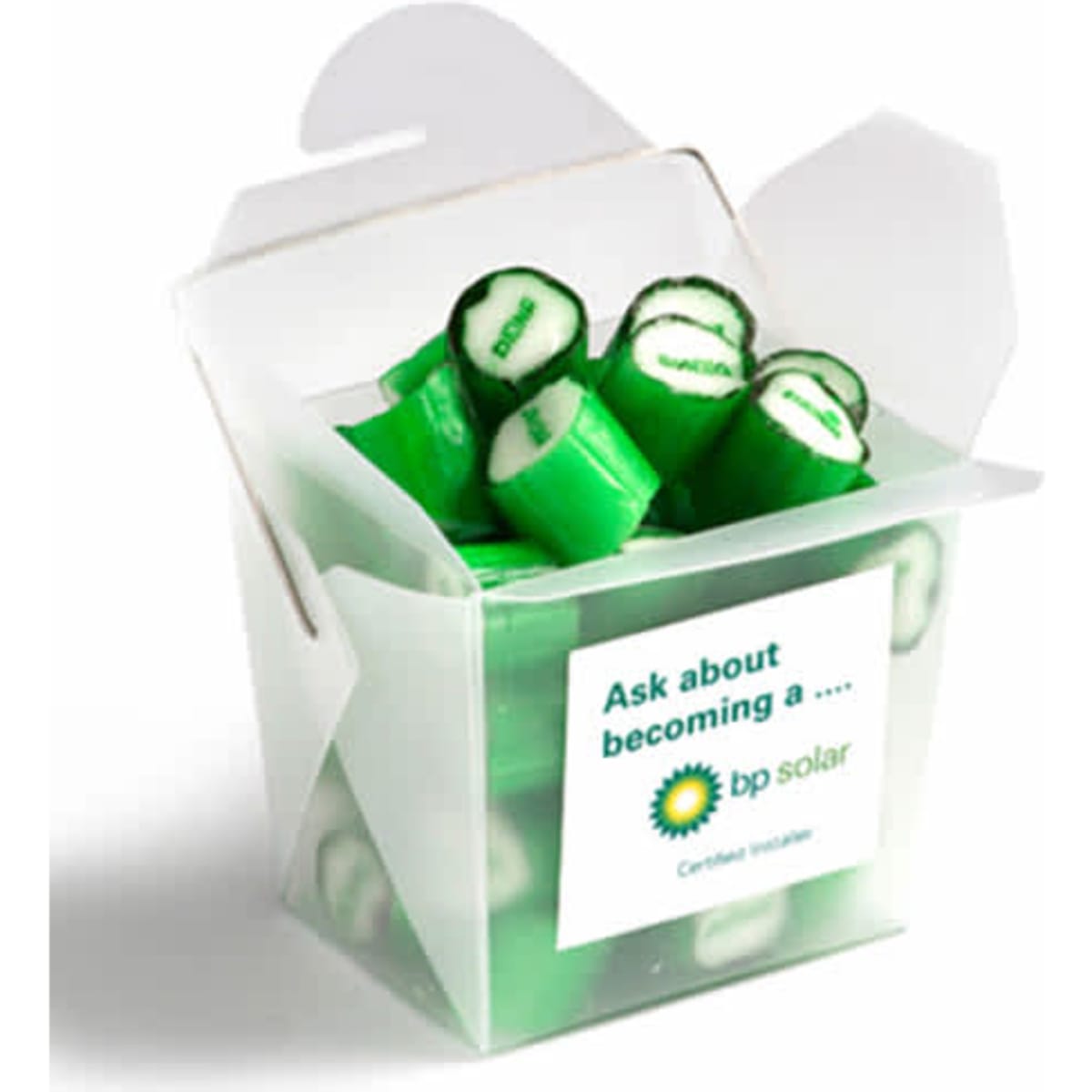 A frosted noodle box containing green personalised rock candy pieces. The box has a logo on it.