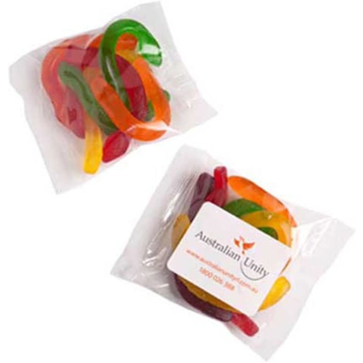 A clear plastic bag contains colourful gummy snakes in red, green, yellow, and orange hues, featuring a logo on the packaging.