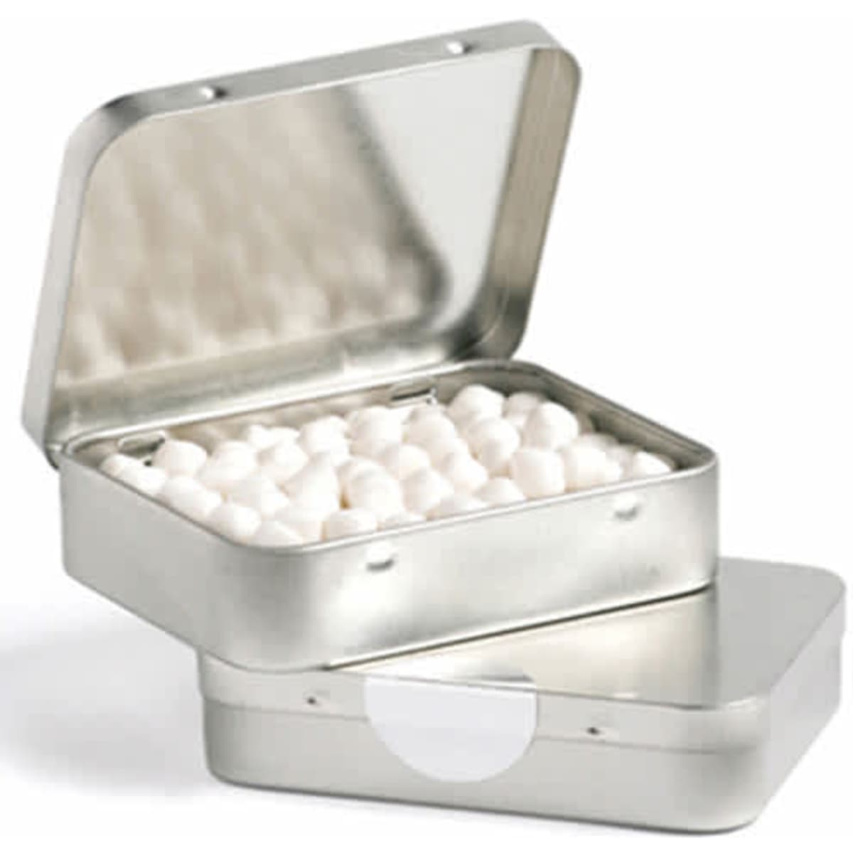 A rectangular silver tin with a hinged lid, filled with white mint balls inside.