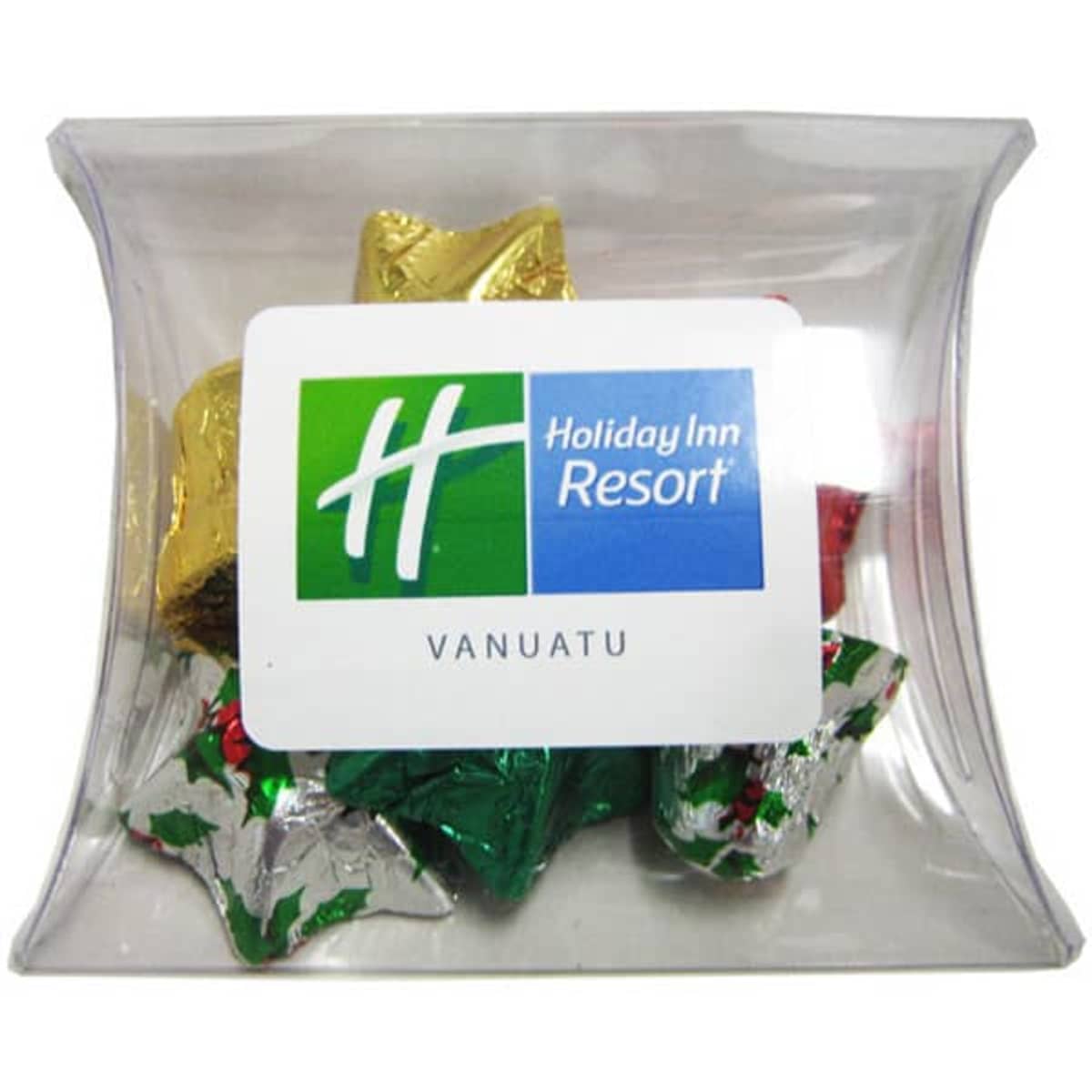 A clear pillow pack containing assorted Christmas chocolates wrapped in festive gold, red, green, and silver foil.