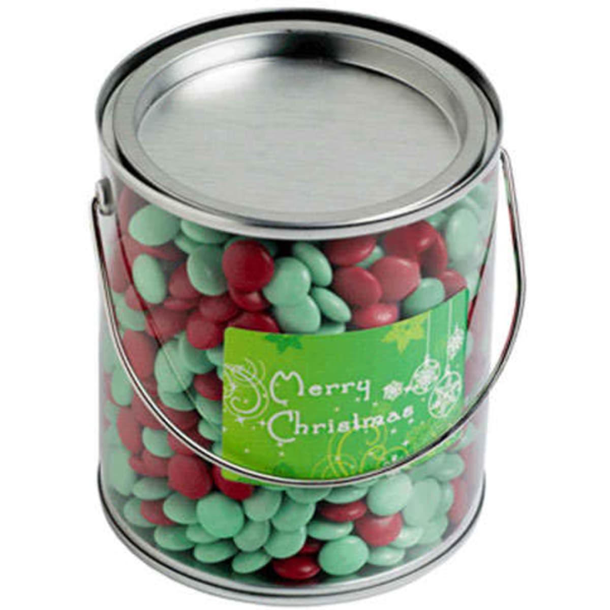 A metal bucket filled with red and green chocolate beans, featuring a festive label on the front.