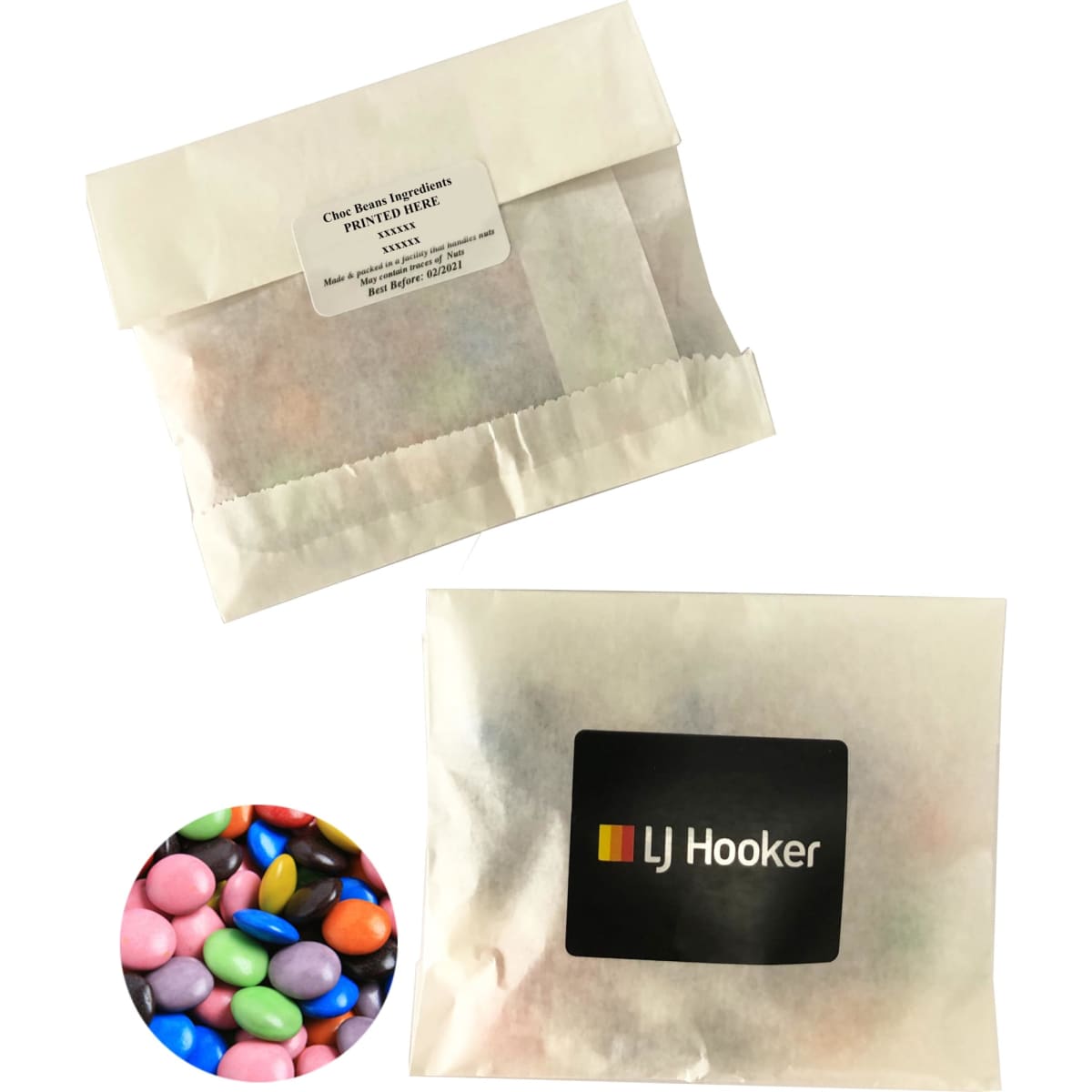 A kraft paper bag containing colourful choc beans, featuring a logo on the front.