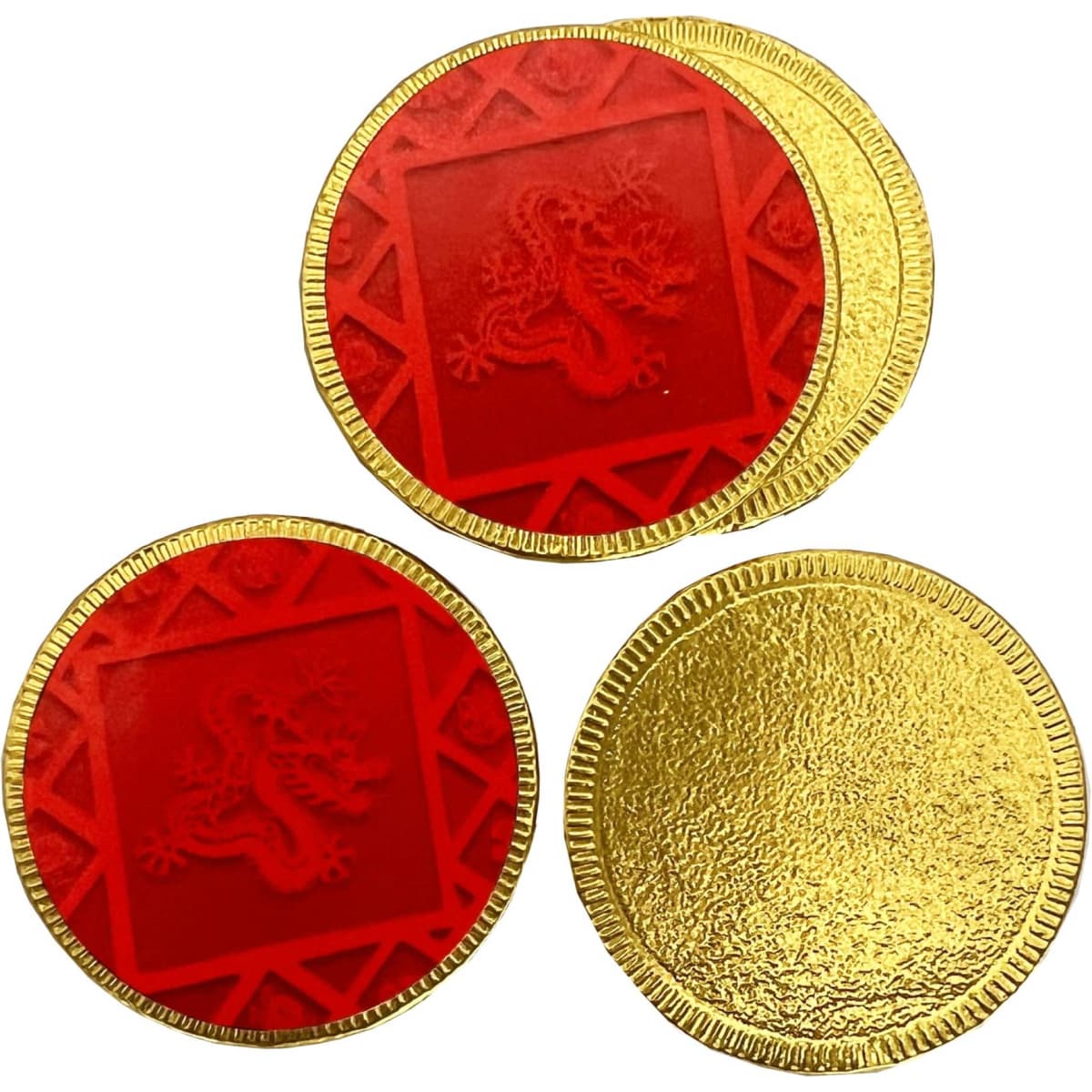 Red and gold chocolate medallions with intricate designs, featuring both red and gold finishes, arranged in a group.