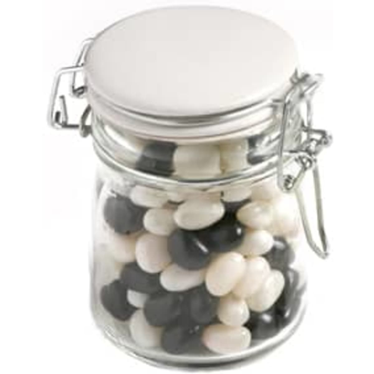 A glass clip lock jar filled with black and white jelly beans. The jar has a metal latch and a silver lid.