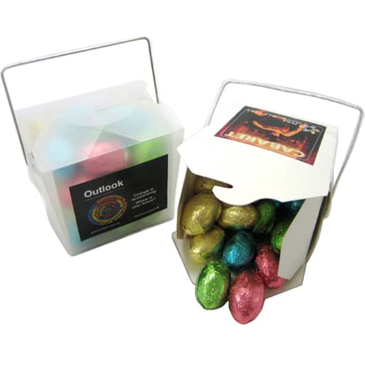 A noodle box containing colourful Easter eggs, including shades of pink, blue, gold, and green. The box has a handle and a logo.