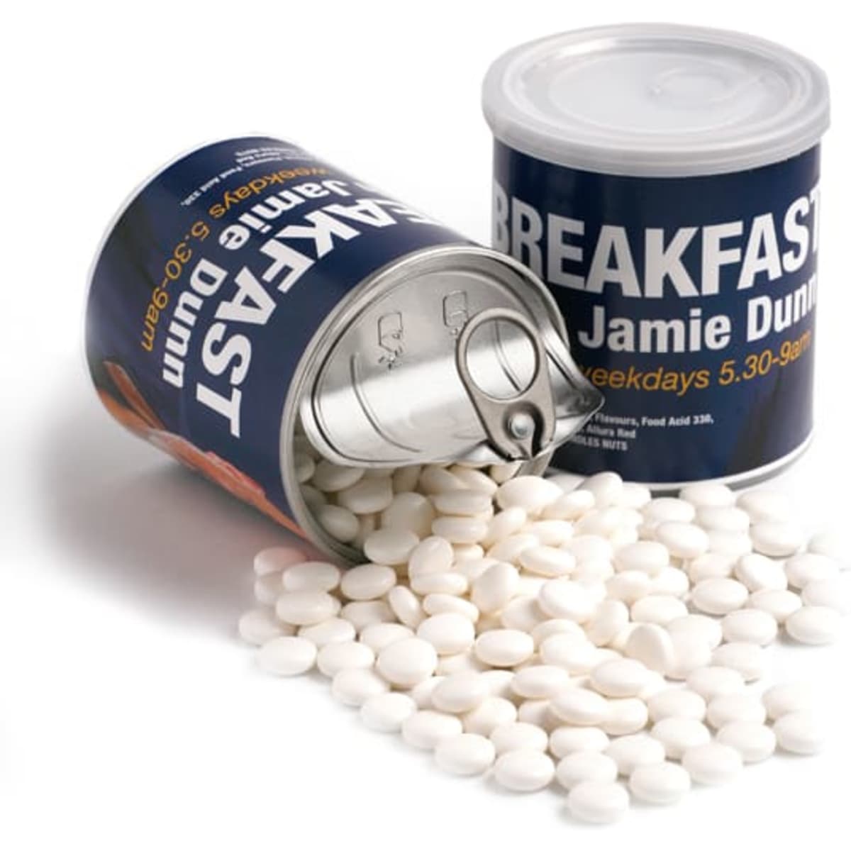 A canister with a pull tab filled with white mints, tipped over with mints spilling out. The can has a logo.