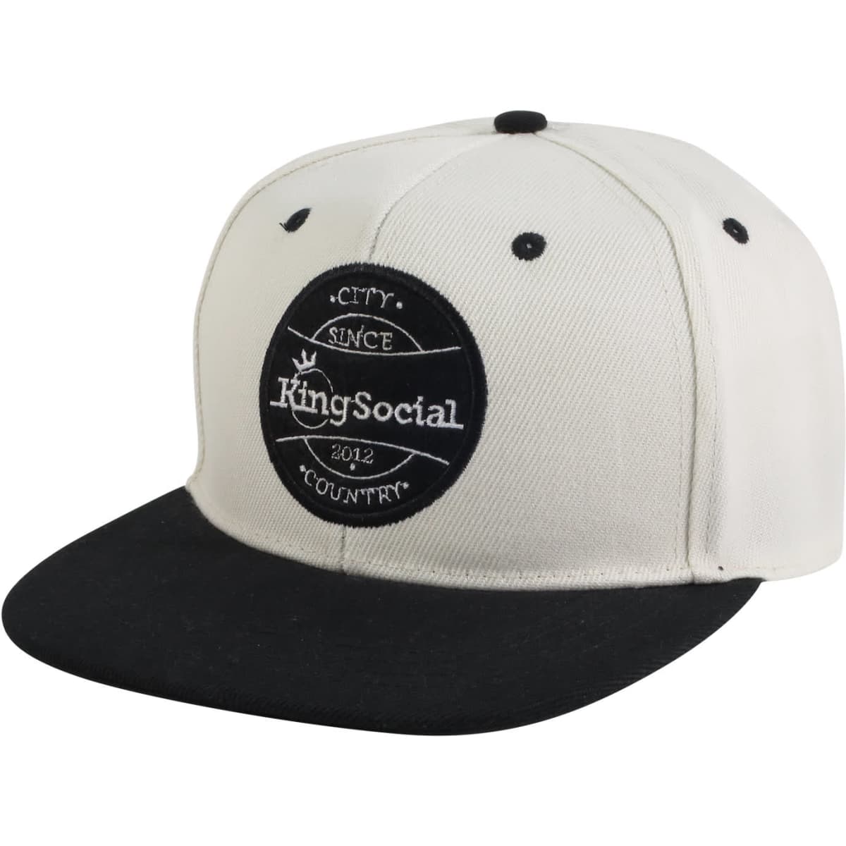 A flat peak cap with a cream-coloured crown and a black peak, featuring a logo on the front.