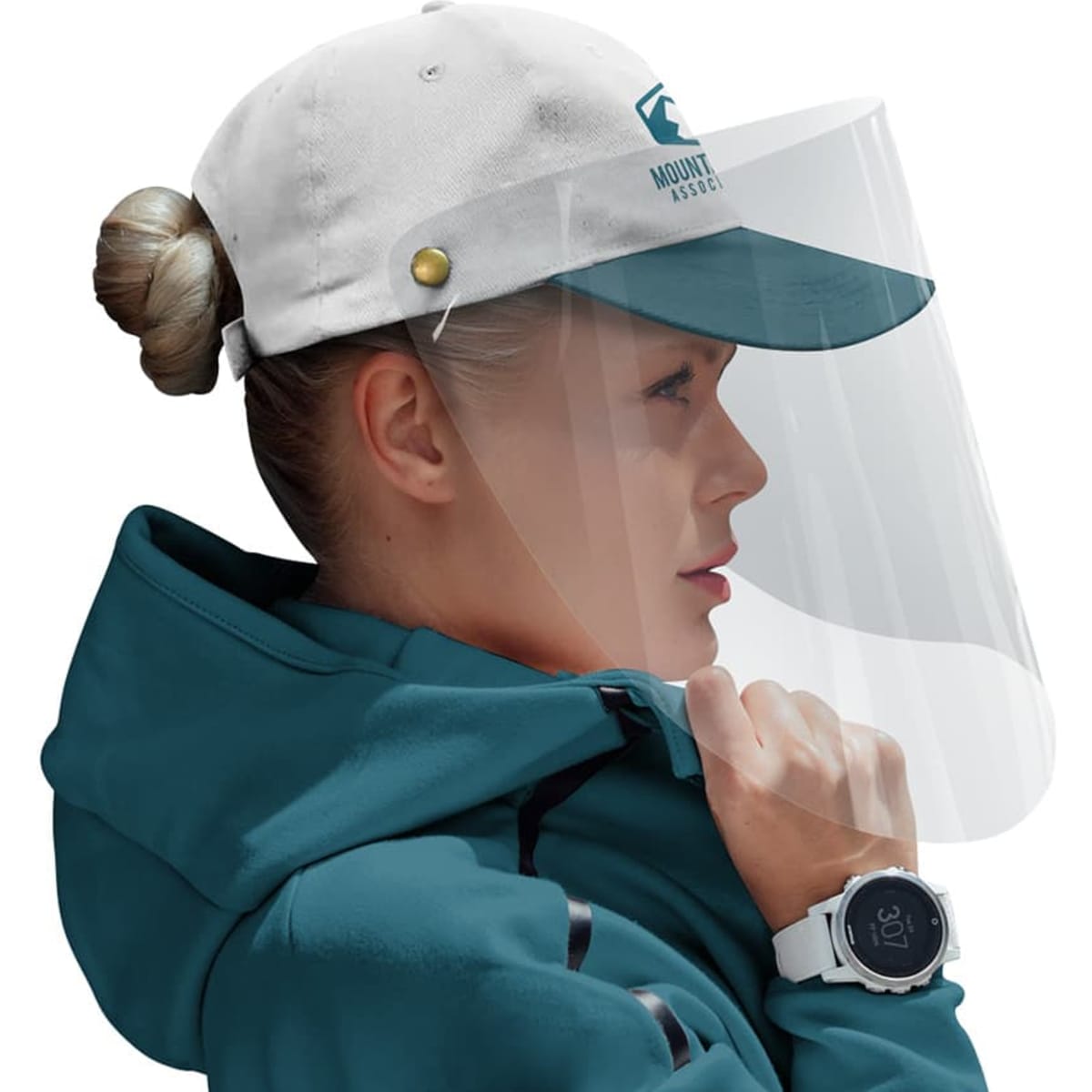 A white and teal cap with a clear protective visor, worn by a person with a bun hairstyle.
