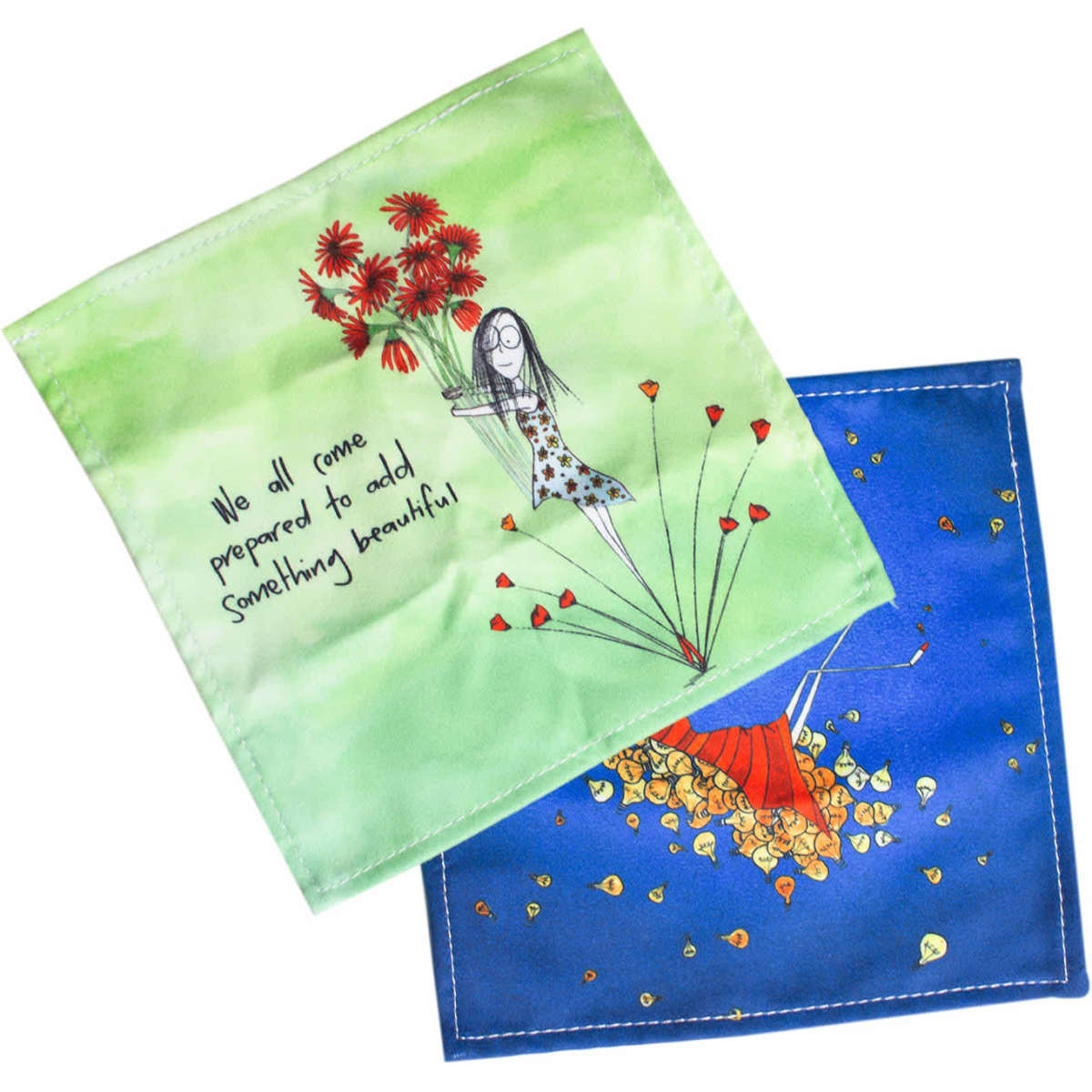 Two lens cloths featuring vibrant colours, one with a green background and floral design, the other in blue with an artistic illustration.