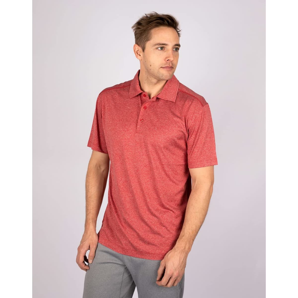 A red men's polo shirt with a collar and short sleeves, featuring a logo on the chest.