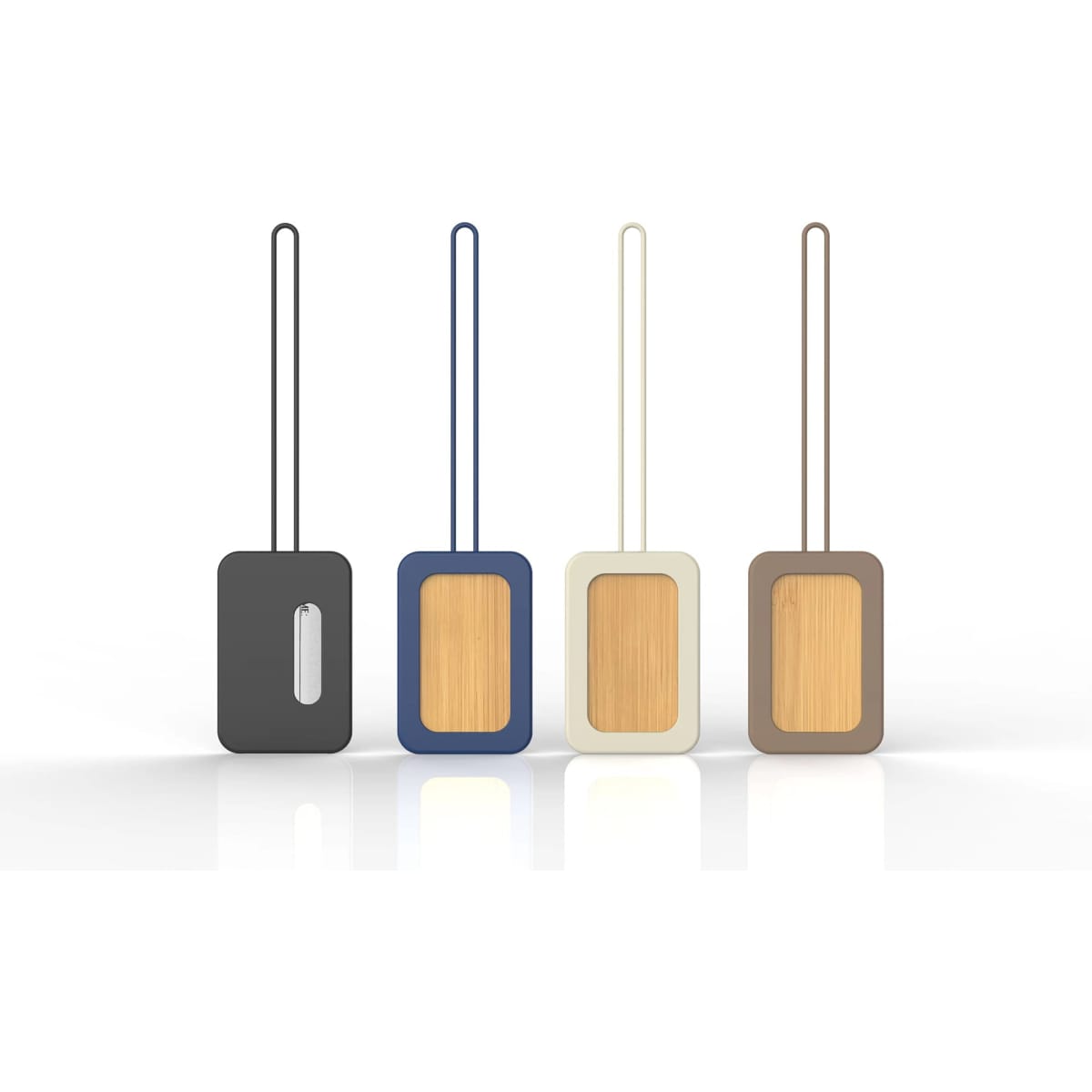 A set of four luggage tags in black, navy, cream, and brown with a wooden panel and built-in loops. Each tag has a logo.