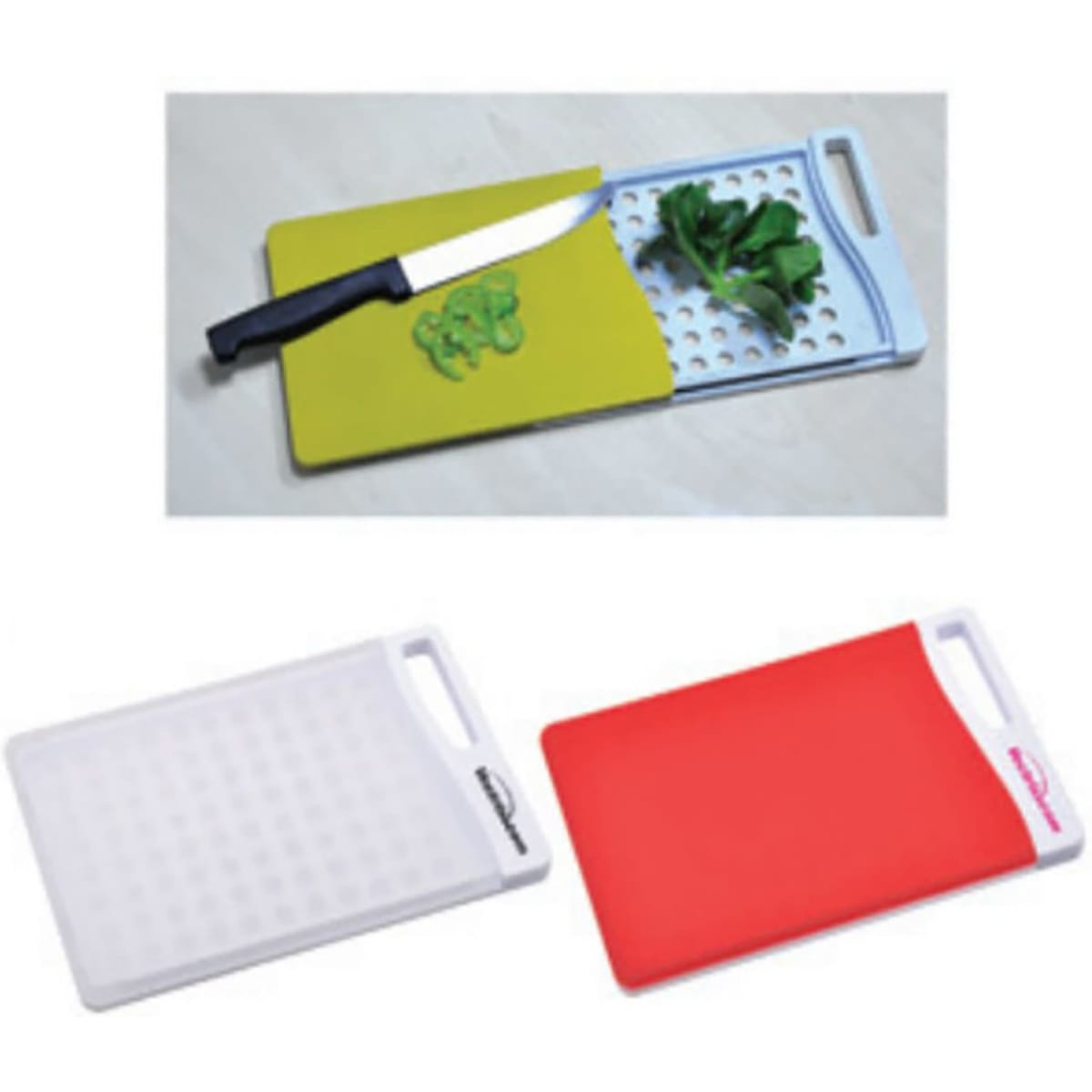A set of chopping boards in white, red, and green, featuring a knife and chopped vegetables on one board.
