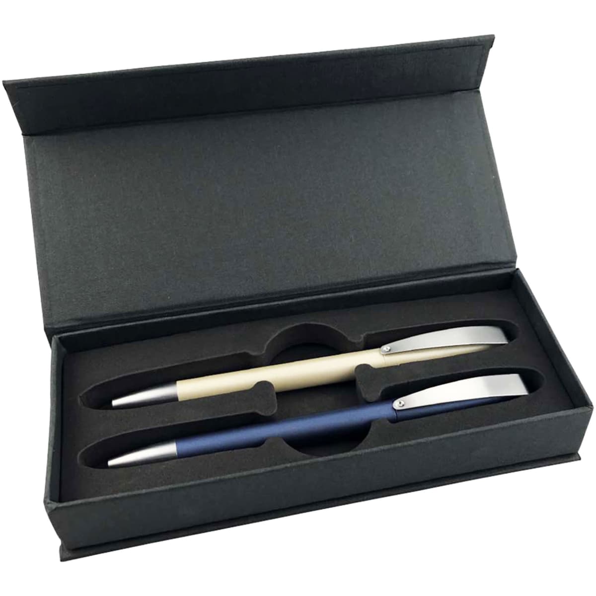 A black gift box containing two metallic pens: one in cream and one in navy, resting in a foam insert.
