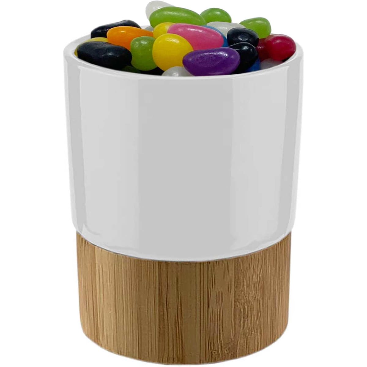 A white mug with a bamboo base filled with colourful jelly beans, featuring various shades like purple, green, and orange.