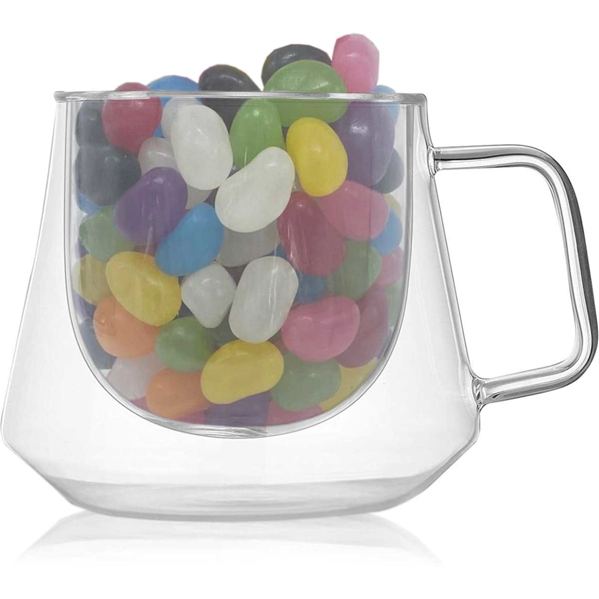 A clear glass coffee cup containing an array of colourful jelly beans. The cup has a handle and a modern design.
