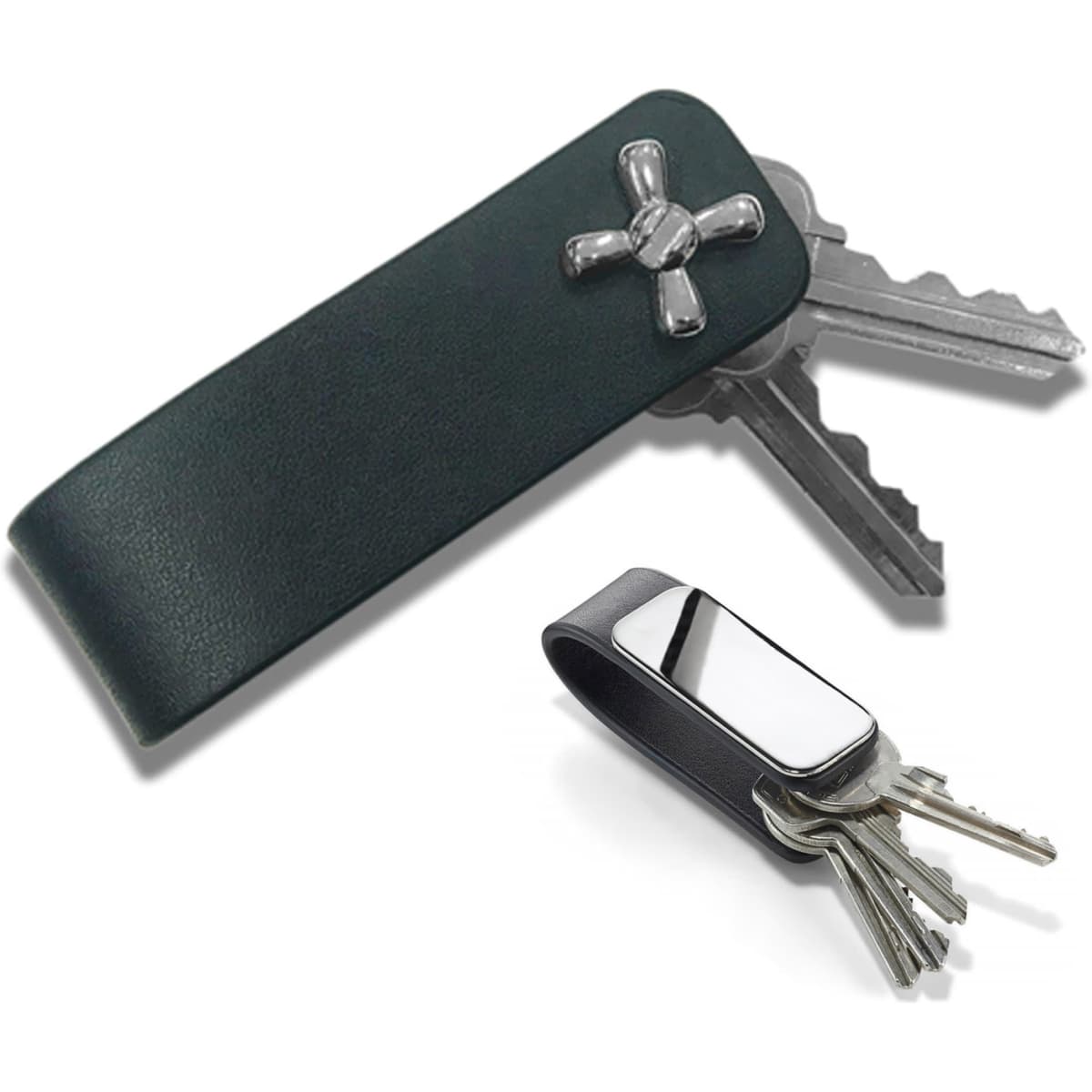 A green leather key holder with a metallic accent, holding multiple keys alongside a silver key holder.