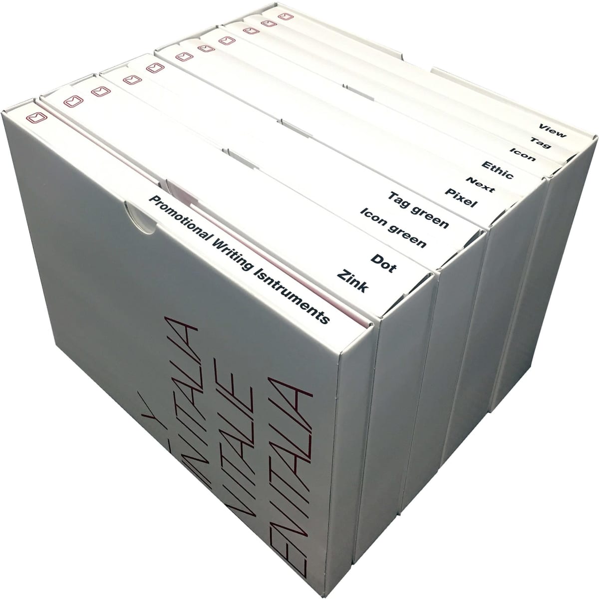 A white box containing several compartments for different writing instruments, labelled with various pen names.