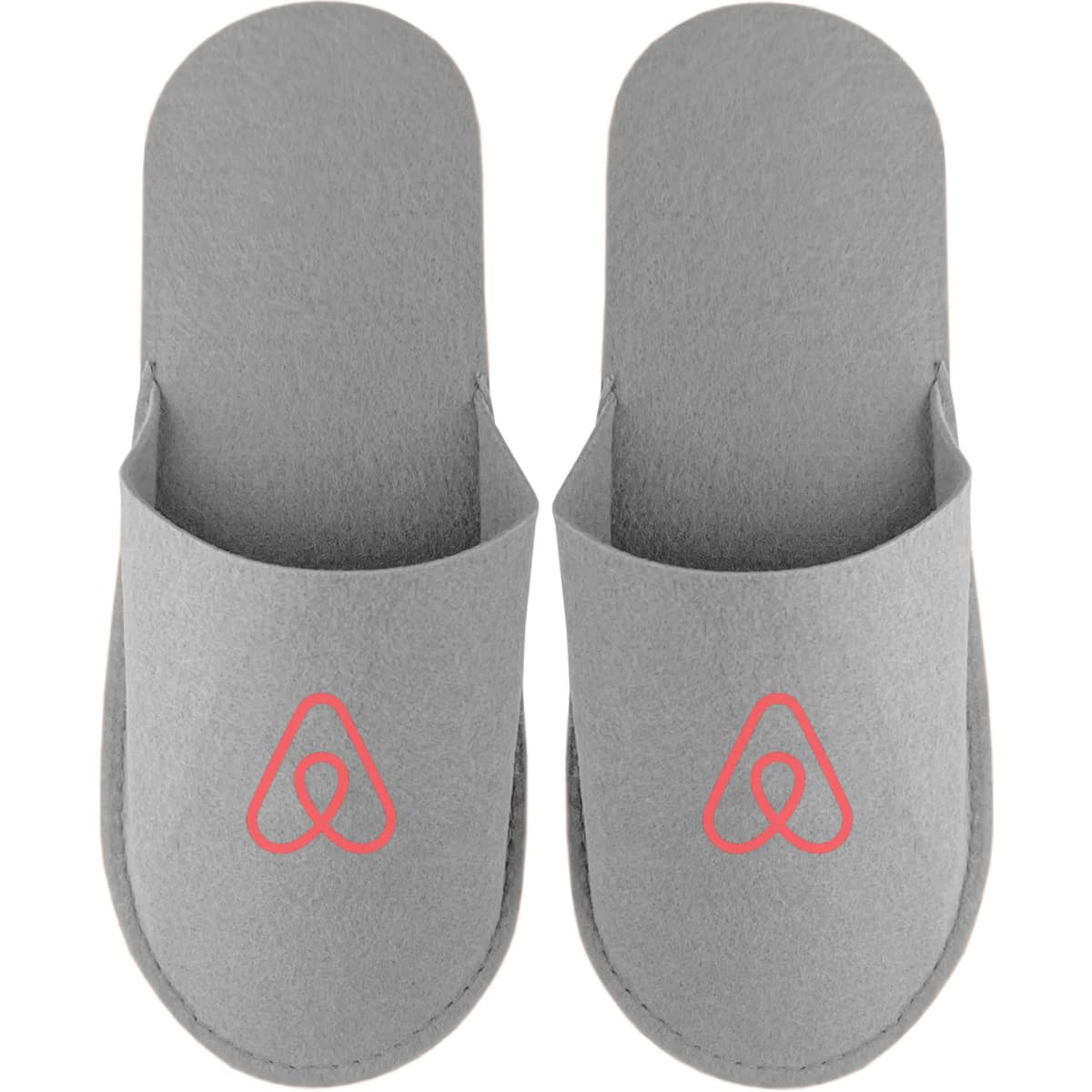 A pair of grey felt slippers featuring a logo, designed for comfort and casual wear.