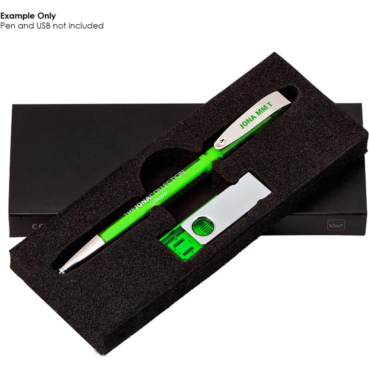 A green pen and a utility knife are presented in a sleek black gift box with foam insert.