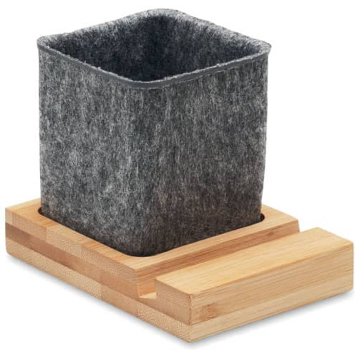 A plant pot made of grey felt sits on a wooden base. The design is simple and modern.