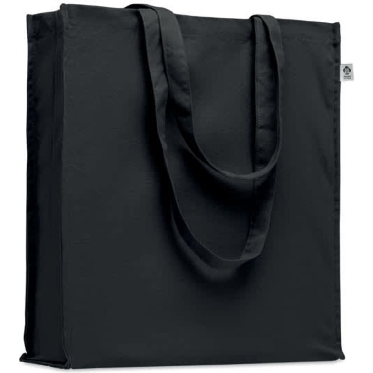 A black tote bag with long handles, featuring a simple design and a logo tag on the side.