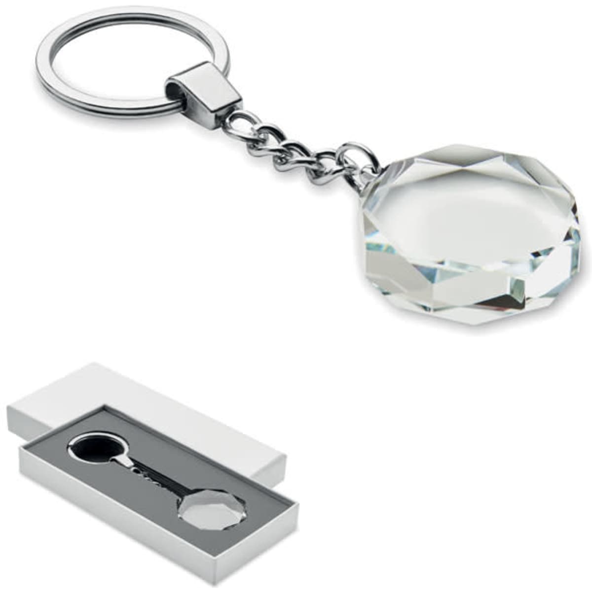 A keychain featuring a faceted clear crystal pendant, presented in a simple white box.
