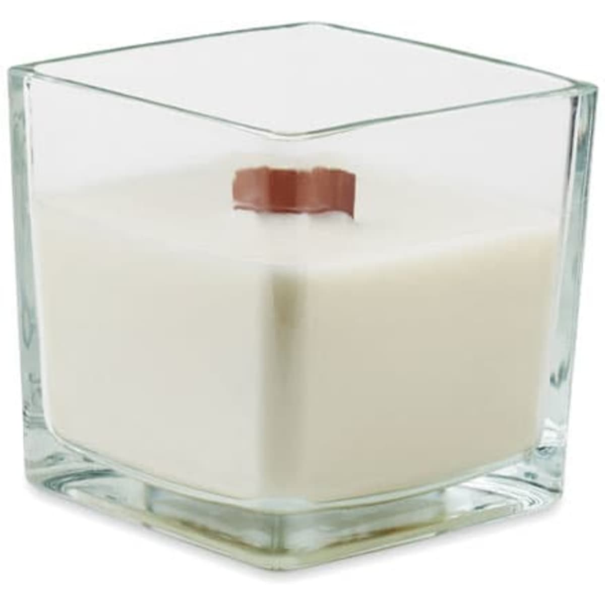 A scented candle in a clear hexagonal glass container, featuring a chocolate-coloured wick and a creamy white wax.