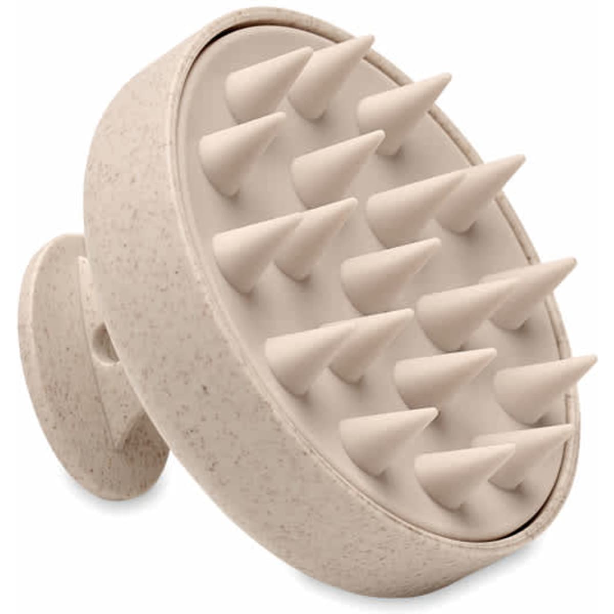 A beige massage tool with multiple pointed spikes, designed for scalp or body use, featuring a round shape.