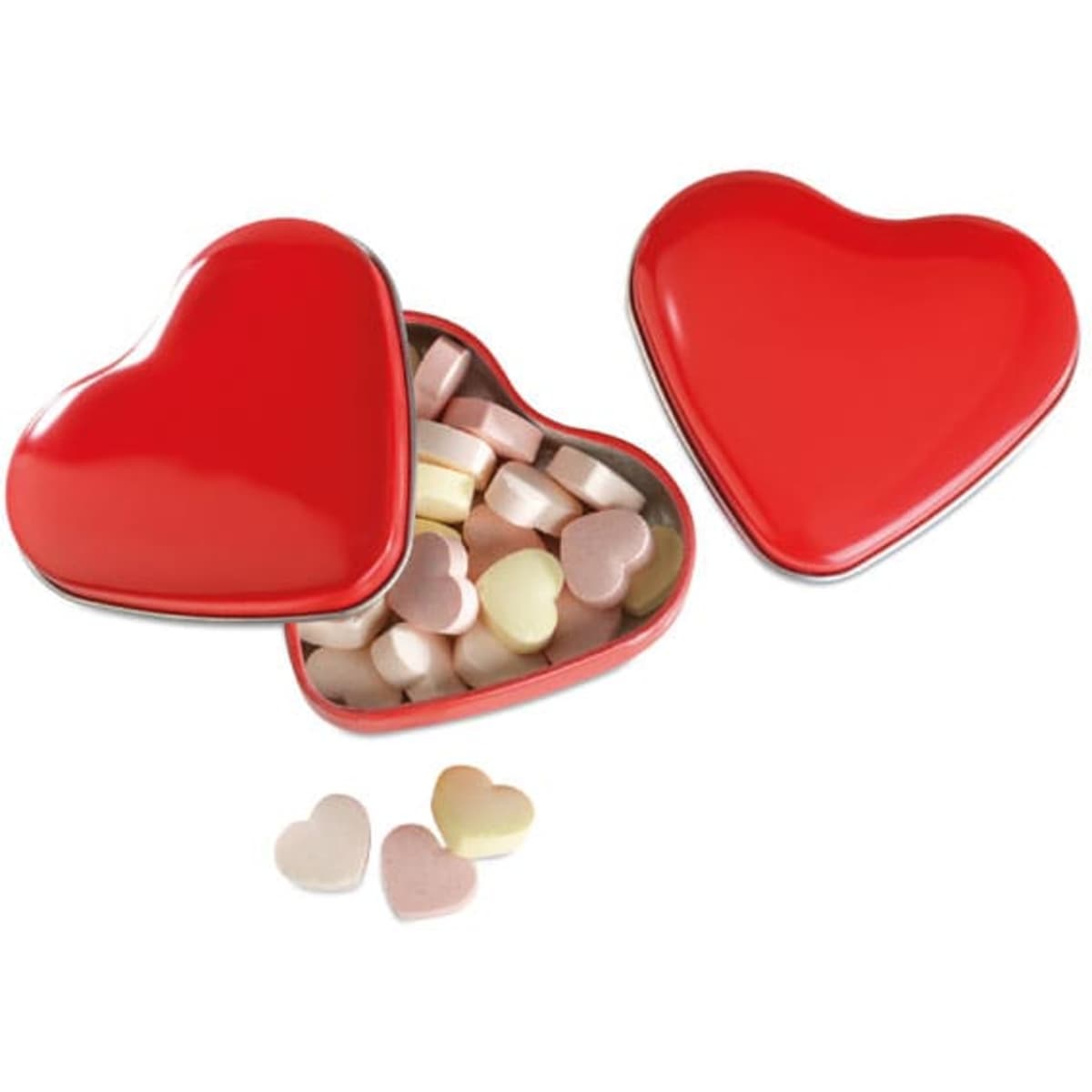 A heart-shaped red tin containing pastel-coloured heart-shaped sweets, with a few sweets outside the tin.