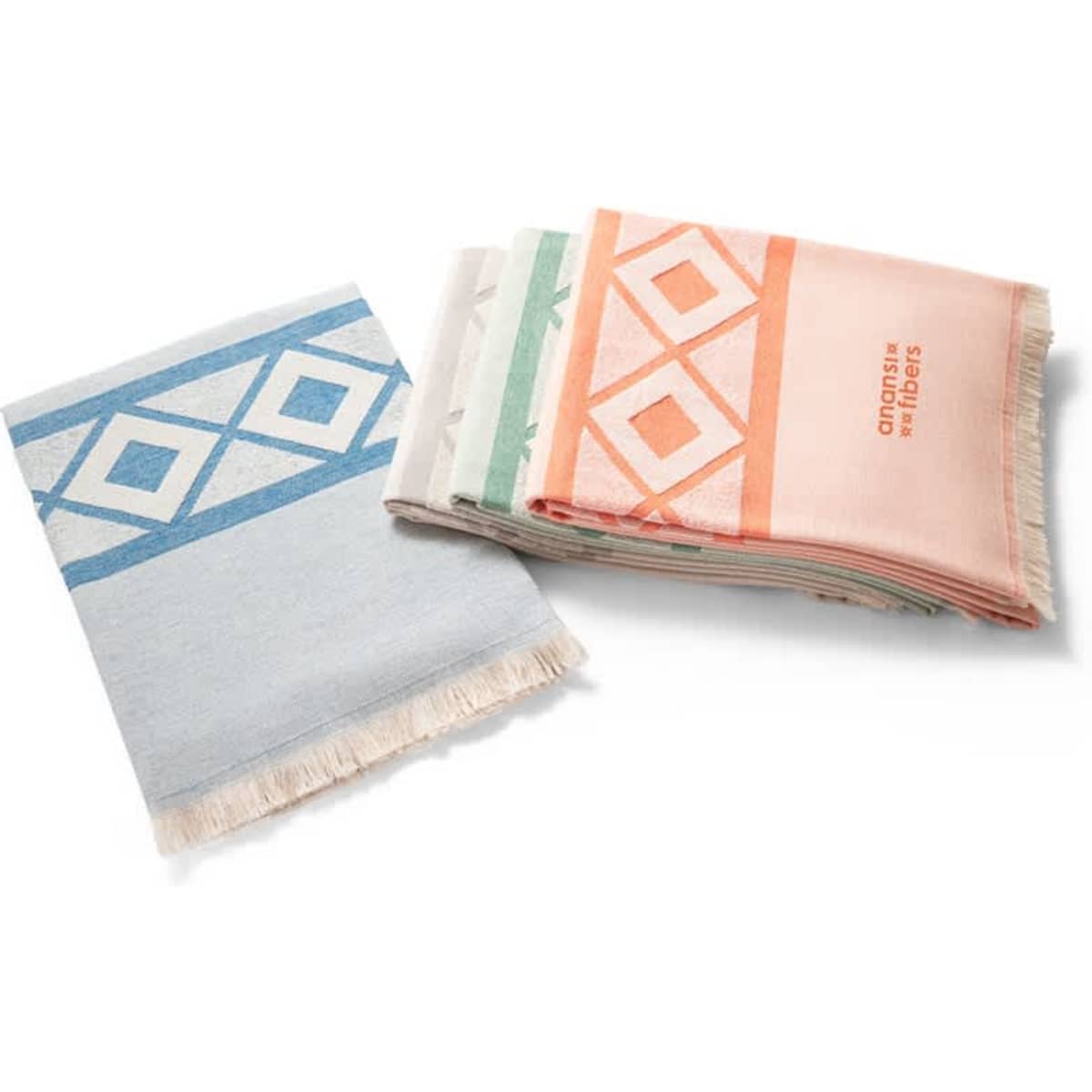 Multifunctional bath towels made of light, resistant cotton, featuring designs in blue, orange, green, and beige.