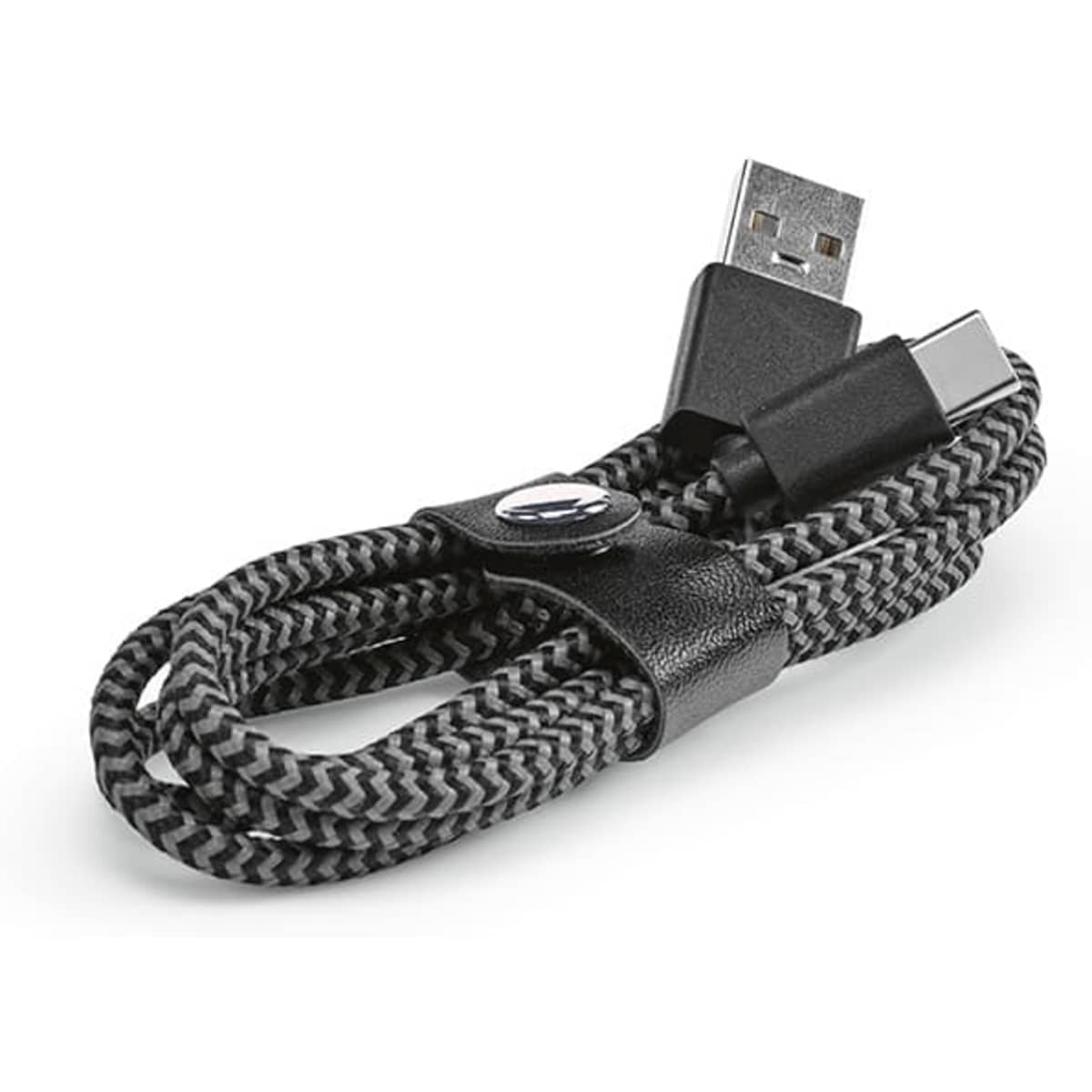A USB-A to USB-C cable in black and grey, featuring a textured braided design and a branded fastener.