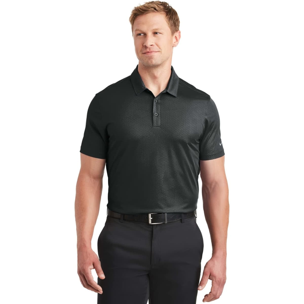 A man wearing a black Nike Dri-FIT embossed tri-blade polo shirt with short sleeves and a subtle pattern.